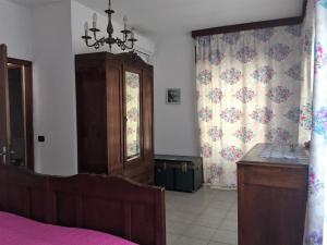 Posteľ alebo postele v izbe v ubytovaní CASAVACANZA CHIARA