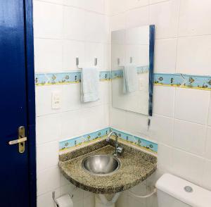 ห้องน้ำของ Casa/Apto em Condomínio na Beira-Mar em Tamandaré / Próximo a Praia dos Carneiros