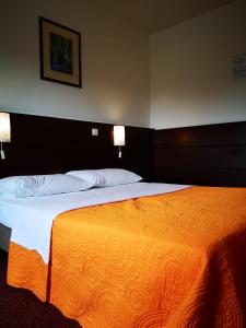 เตียงในห้องที่ Motel Plitvice Zagreb