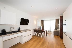 Kuchyň nebo kuchyňský kout v ubytování Hotel Storck