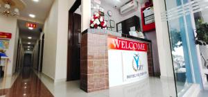 a lobby with a welcome sign in a building at Hotel Victory Inn KLIA and KLIA 2 in Sepang