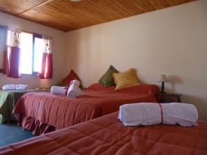 Una cama o camas en una habitación de Vista Serrana