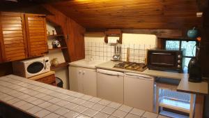 Η κουζίνα ή μικρή κουζίνα στο Moulin de Saint Cricq