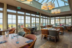 Restaurant ou autre lieu de restauration dans l'établissement Botany Bay Hotel