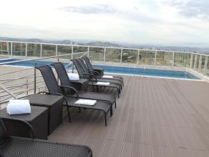 A piscina localizada em Allia Gran Pampulha Suites ou nos arredores