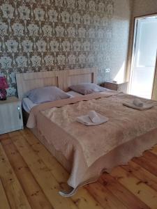 Letto o letti in una camera di Elco