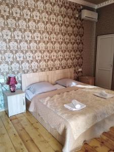 Letto o letti in una camera di Elco