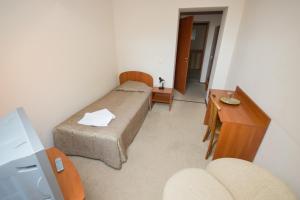 Ein Bett oder Betten in einem Zimmer der Unterkunft Deims Hotel