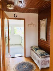 a room with a bed in a room with a doorway at Ferienwohnung Molter in Oberthal