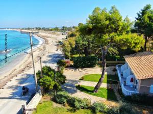 a view of the beach from the balcony of a house at Makis&Fani Homes in Lefkada Town