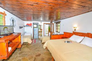 Postel nebo postele na pokoji v ubytování Hotel Cabeça de Boi + 75 fotografií