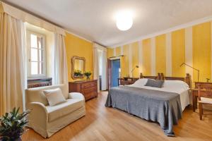 Postel nebo postele na pokoji v ubytování Hotel Pironi