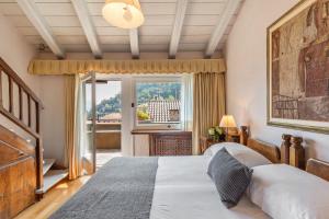 Postel nebo postele na pokoji v ubytování Hotel Pironi