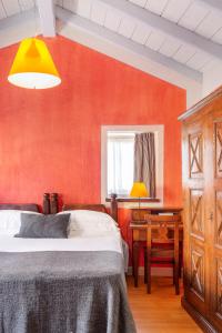 Postel nebo postele na pokoji v ubytování Hotel Pironi