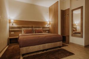 Postel nebo postele na pokoji v ubytování Villa Martini - apartments & rooms