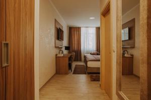 Postel nebo postele na pokoji v ubytování Villa Martini - apartments & rooms
