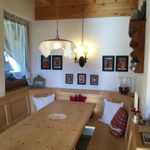 Postel nebo postele na pokoji v ubytování Mansarda Dolomiti