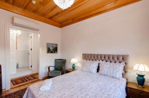 Uma cama ou camas num quarto em Dutlu Konak
