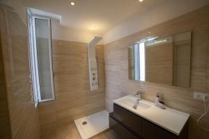 Koupelna v ubytování B&B Miramare Suite + 37 fotografií