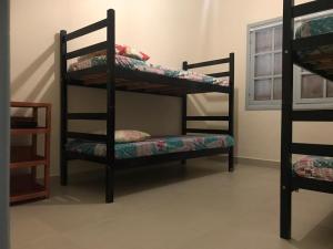 En eller flere senge i et værelse på Casa Frente MAR PISCINA + 28 billeder