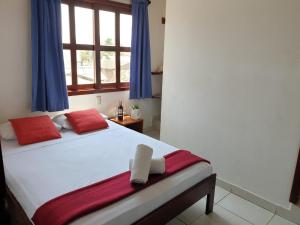 Voodi või voodid majutusasutuse Cocoa Inn Hostal toas