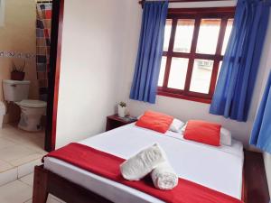Voodi või voodid majutusasutuse Cocoa Inn Hostal toas