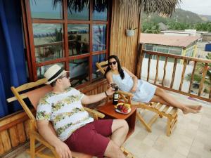 Rõdu või terrass majutusasutuses Cocoa Inn Hostal