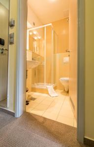 Koupelna v ubytování Hotel Center Pokljuka