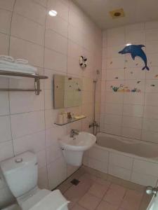 Koupelna v ubytování Hearty Homestay
