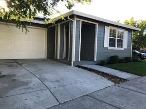 a house with a driveway in front of it at Spacious 3BD,2BA, ideal for families! in Santa Rosa