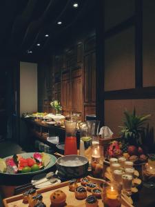 a table with a buffet of food on it at Minh Boutique in Danang
