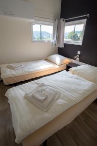 Ein Bett oder Betten in einem Zimmer der Unterkunft Camping Kaul
