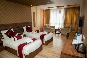 Katil atau katil-katil dalam bilik di The Address Kathmandu Hotel