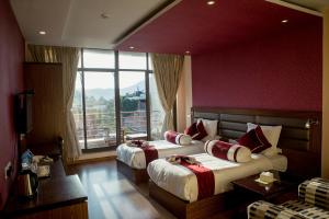 Katil atau katil-katil dalam bilik di The Address Kathmandu Hotel