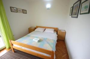 Postel nebo postele na pokoji v ubytování Apartment Stefani by El-Pi Tours