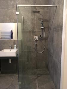 Koupelna v ubytování Romantika v Tatrách - apartmán Vila Hollý