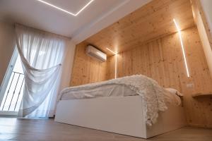 Postel nebo postele na pokoji v ubytování A Casa Di