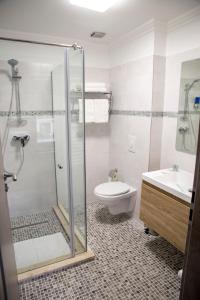 Kylpyhuone majoituspaikassa Hotel Yarus Plus