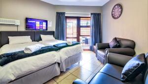 Katil atau katil-katil dalam bilik di JoziStay @ Savannah Apartments