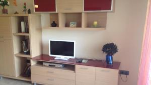 TV a/nebo společenská místnost v ubytování Golden Beach 108