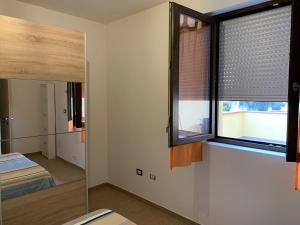 Postel nebo postele na pokoji v ubytování Ema Home