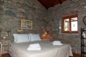 Postel nebo postele na pokoji v ubytování Oceanis cottage house