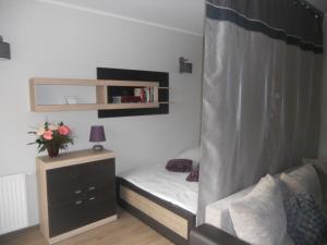 Postel nebo postele na pokoji v ubytování Apartament-Studio