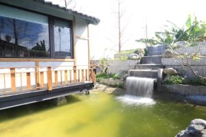 Un jardín fuera de Jiang's B&B 江院子庭園民宿