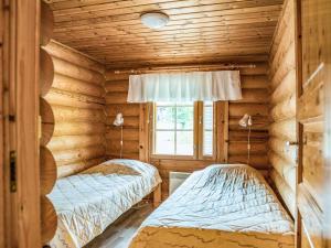 Postel nebo postele na pokoji v ubytování Holiday Home Kieppi b by Interhome