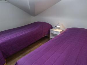 En eller flere senge i et værelse på Holiday Home Levähdys by Interhome + 8 billeder