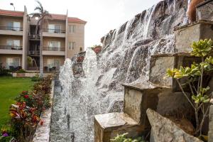 Zahrada ubytování Panacea Suites Hotel