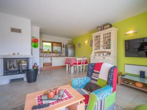 a living room with a couch and a table at Holiday Home Lady Lavender by Interhome in Mrkopalj +27 photos