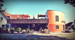 a building with bikes parked in front of it at Hotel Nagel in Lindau