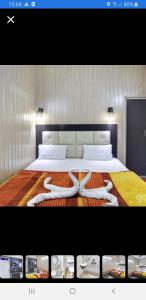Кровать или кровати в номере Hotel Shehnaz Inn - Walking Distance for Golden Temple